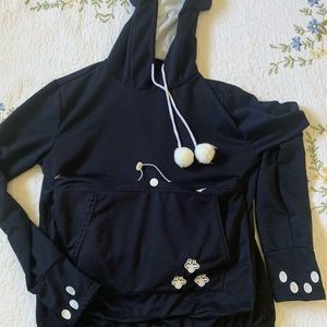 Cat pouch sweatshirt.